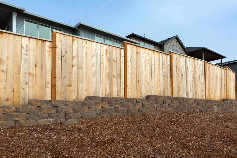 New wooden fencing in a backyard