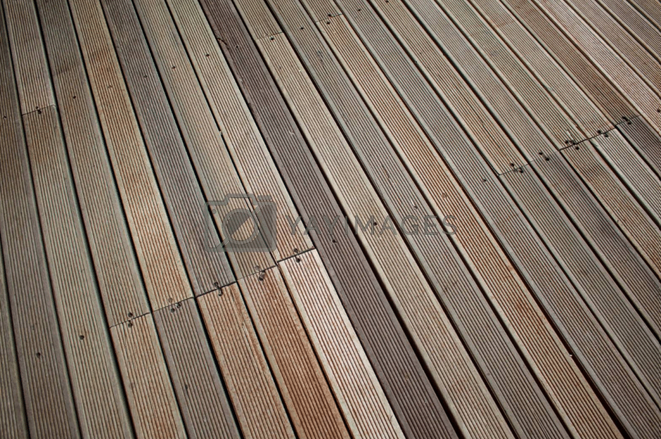 A wooden deck with lumber pattern