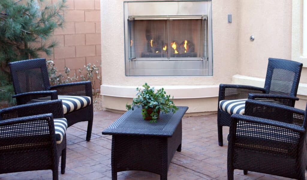 Outdoor fireplace with outdoor living furniture